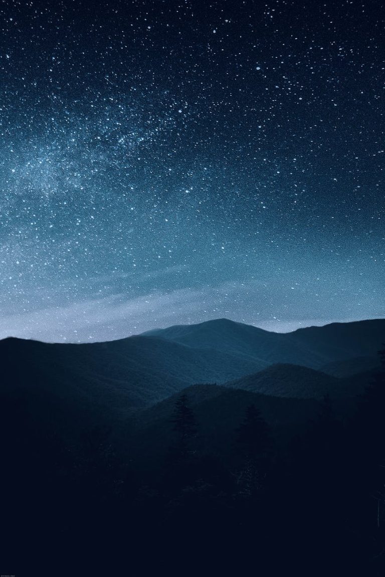 starry sky over mountains