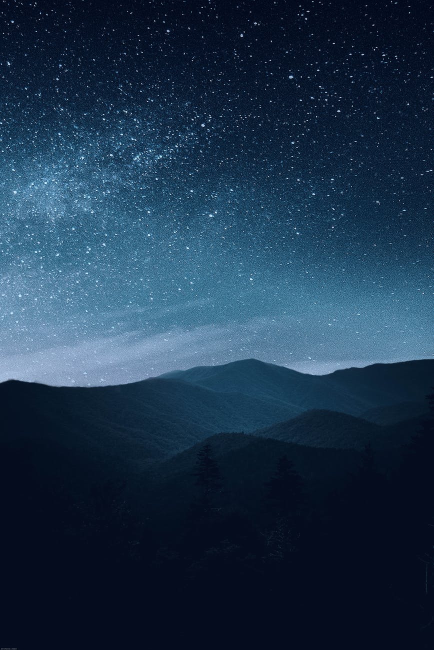 starry sky over mountains